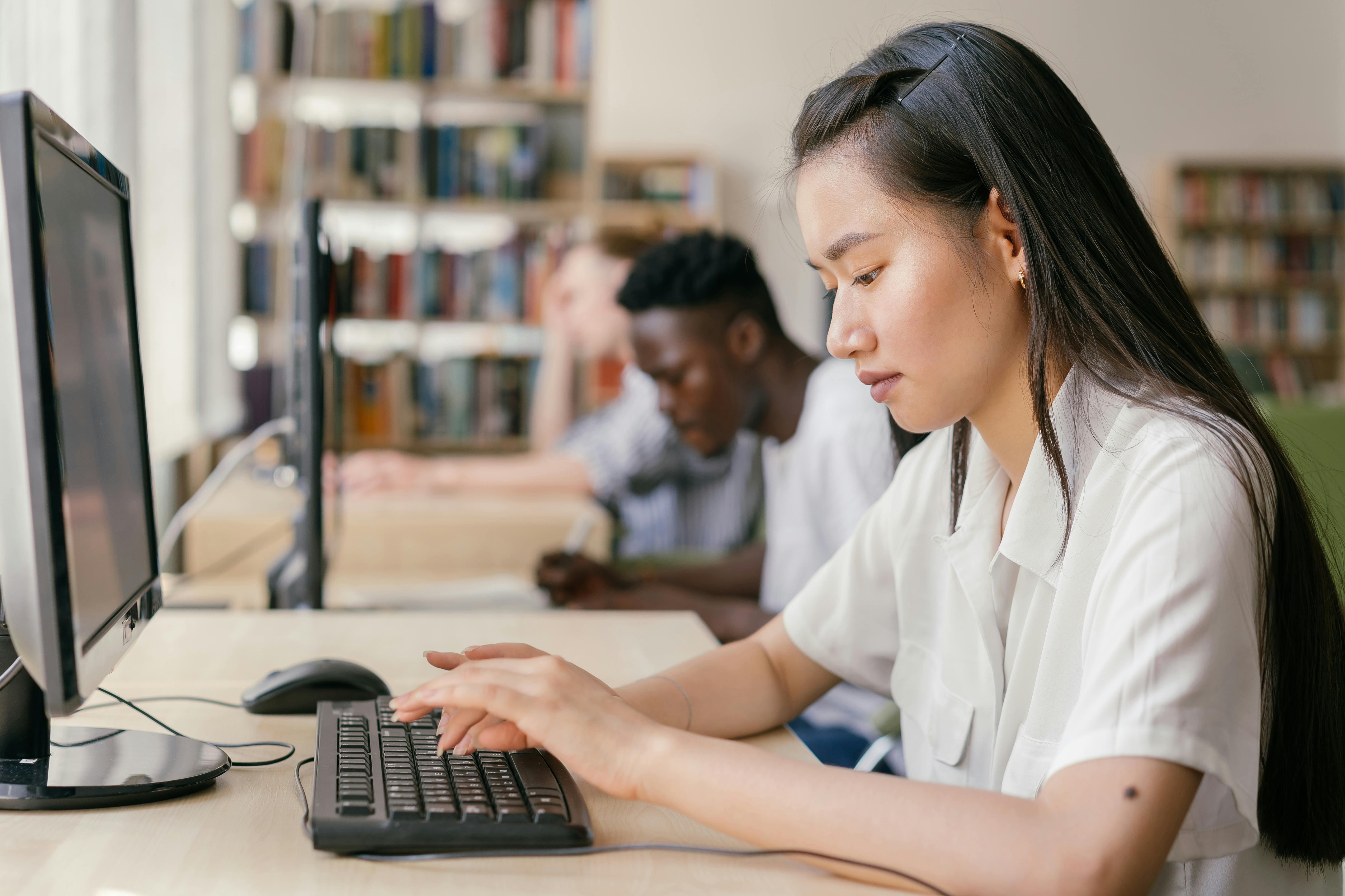 School staff member using computer for secure data management